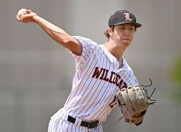 64c53b0d-5ab7-4fb1-9fe8-e636a2f999ba Carson Holmes Leads Libertyville Wildcats with Experience and Determination