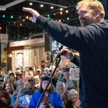 Democratic Senate Nominee Faces Backlash for Controversial Posts