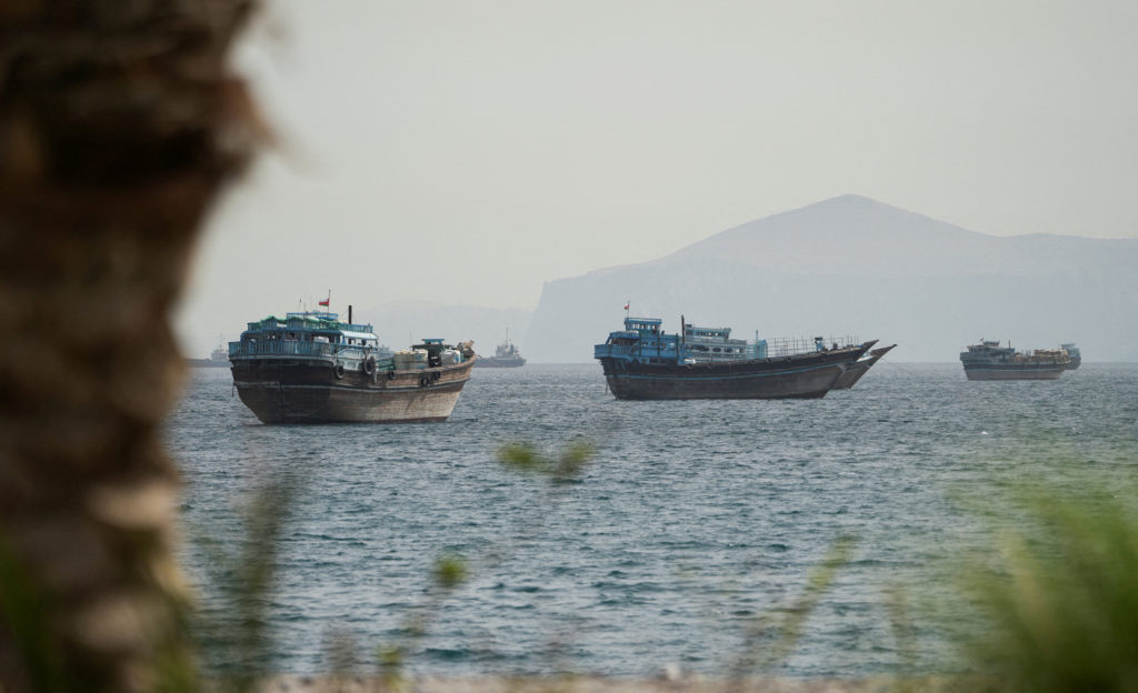 Vessels sail through the Strait of Hormuz Potential U.S.-Iran Deal to End War and Reopen Strait of Hormuz