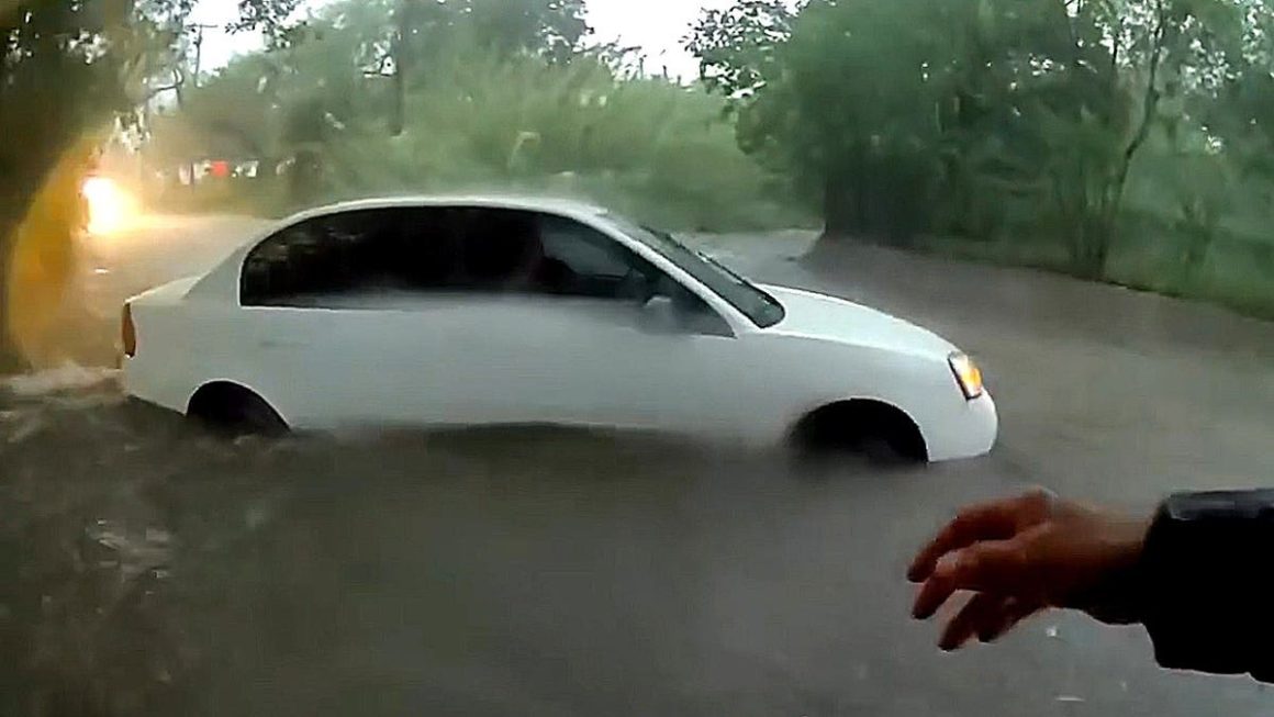 Dramatic Rescue of Baby from Flooded Vehicle in Texas