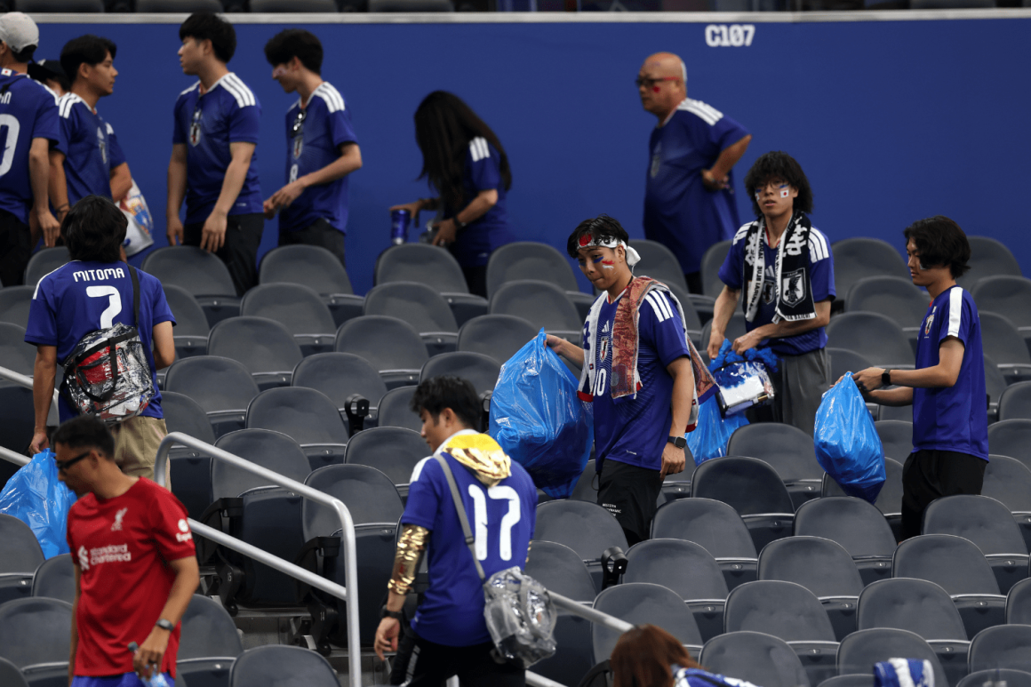Japanese Fans Set Example by Cleaning Up After World Cup Match