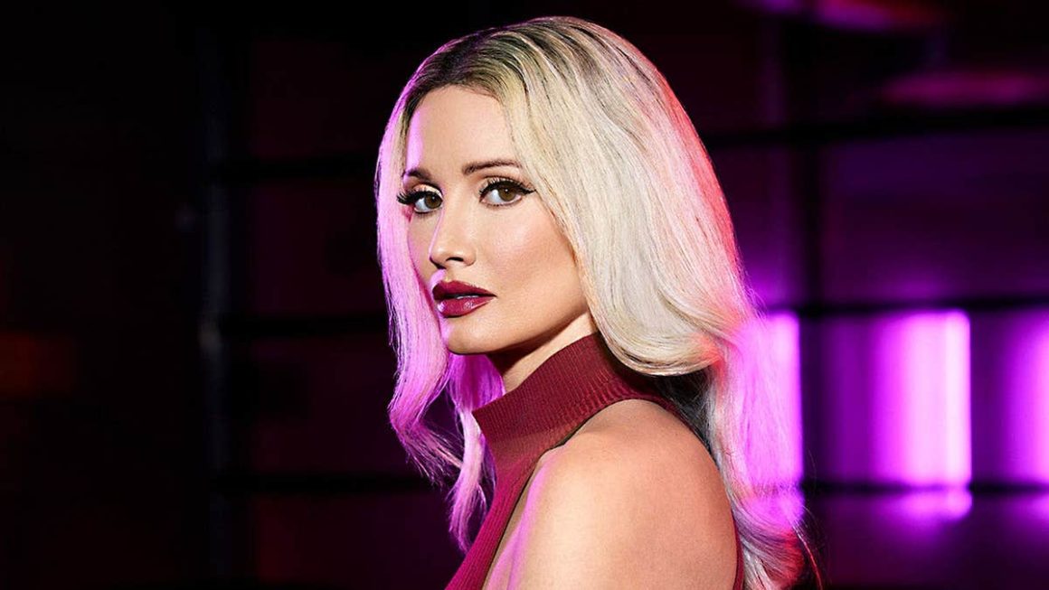 1c7839fa-dbc8-47d4-aad1-e9c5a9aad8a4 Holly Madison Reveals Dangers Beneath Hollywood’s Glamour