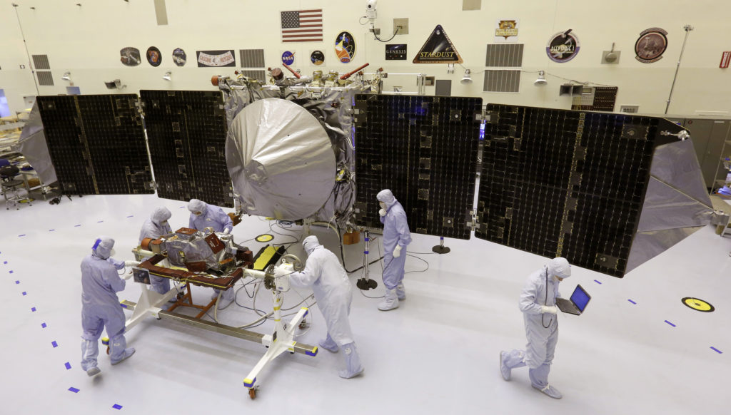Technicians work on NASA's next Mars-bound spacecraft, the Mars Atmosphere and Volatile Evolution (MAVEN) spacecraft, as it is displayed for the media at the Kennedy Space Center in Cape Canaveral NASA Declares Maven Spacecraft Dead After Long Mars Mission