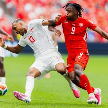 55e6bd21-2968-4a81-b94b-5a62c5fde410 Switzerland Triumphs Over Canada in World Cup Match