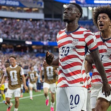 5a20b92e-1e53-4f3b-b66c-45b410fcd317 World Cup Sparks Community Unity and Political Debate