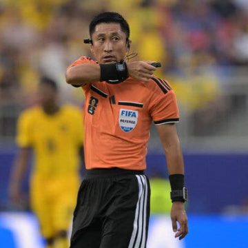 Chinese Referee Ma Ning Draws Attention in World Cup Debut