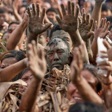 Filipino Devotees Celebrate Unique Mud Festival Honoring St. John the Baptist