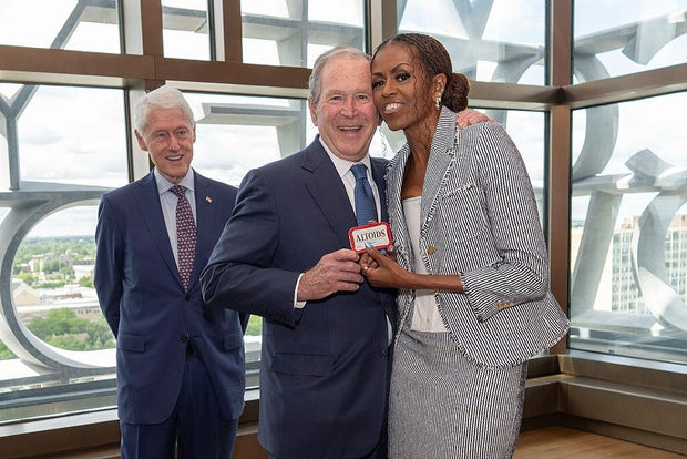 d2dac27d-0ff8-4bbd-9b32-6cc4e110eafd Obama Presidential Center Ceremony Highlights Unique Bond Between Former Leaders