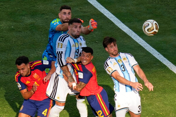 1904c2e7-8f4a-40aa-b398-cf36b444839b Spain Triumphs Over Argentina in World Cup with Torres’ Decisive Goal