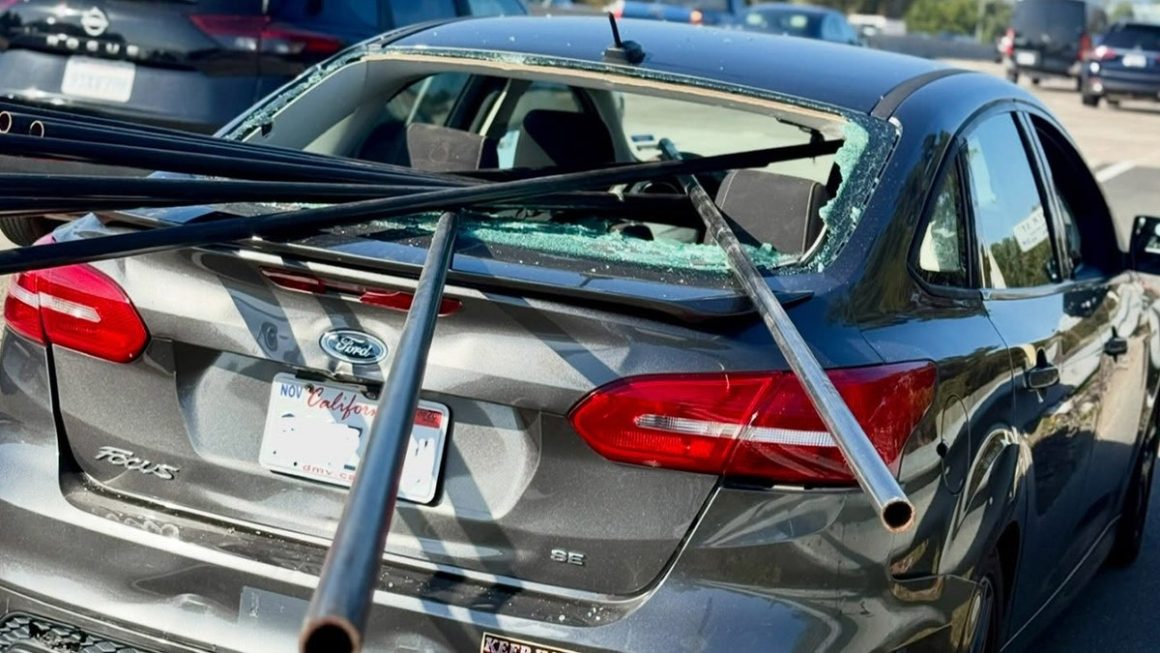 Driver Escapes Injury as Metal Pipes Shatter Windshield on California Highway