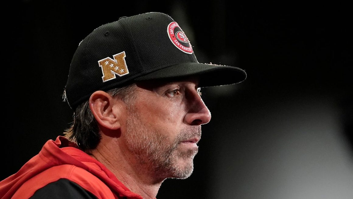 3877401b-36ba-4895-bd7a-1ba77fd4e55e Kyle Shanahan Returns with Caution After Crash and Concussion