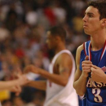 57cf7576-8c4b-4892-9420-bd4873c2a67a Kansas Coach Brett Ballard Injured in Serious Car Crash