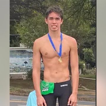 Former Swimmer Charged in Graveyard Shift Security Guard’s Death