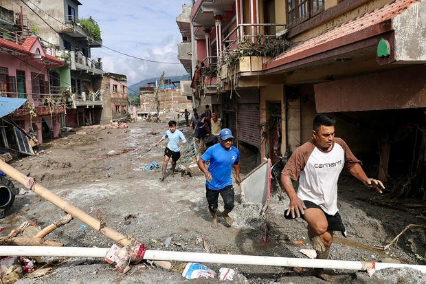 9b4c60c0-86c4-4709-bf2d-ae106ad5147c Catastrophic Floods: Rescuers Search for Missing Along Nepal-China Border