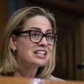 Legal Battle Unfolds Over Former Senator Kyrsten Sinema’s Relationship
