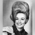 Dolly Parton: A Legendary Journey in Music, Film, and Philanthropy