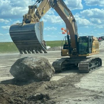 Massive Boulder Unearthed at O’Hare Airport Sparks Public Interest