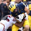 Michigan Leads Oklahoma at Halftime with Strong Defense