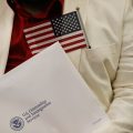 Former USCIS Officer Charged in Immigration Benefits Scheme