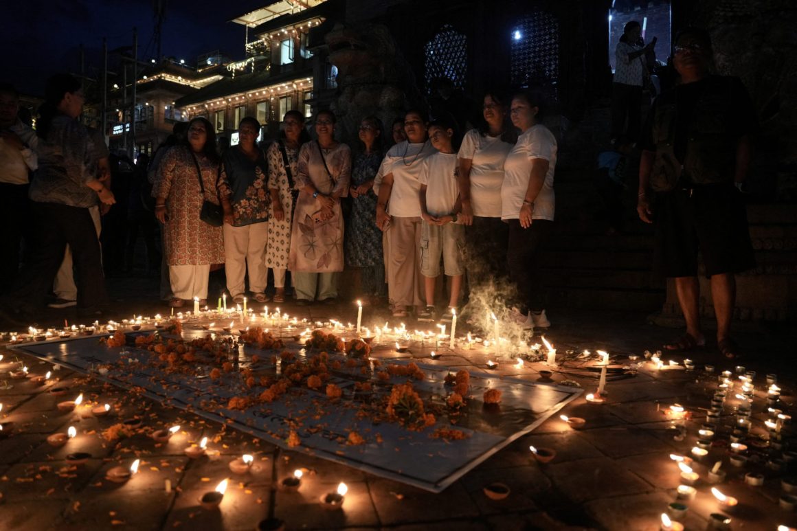 Butter lamps and candles are lit in the Basantapur Durbar Square in Kathmandu Nepal Observes National Mourning Day for Flood Victims