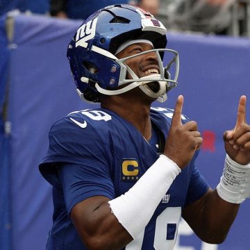 cffe7c9c-f8d9-4e9d-87e8-fc1cc1129a74 Giants Secure Narrow Victory Over Titans