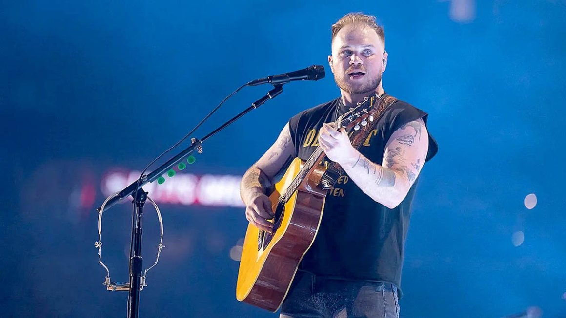 Controversy Surrounds Zach Bryan’s ‘Free Palestine’ Shirt at Gillette Stadium Performance