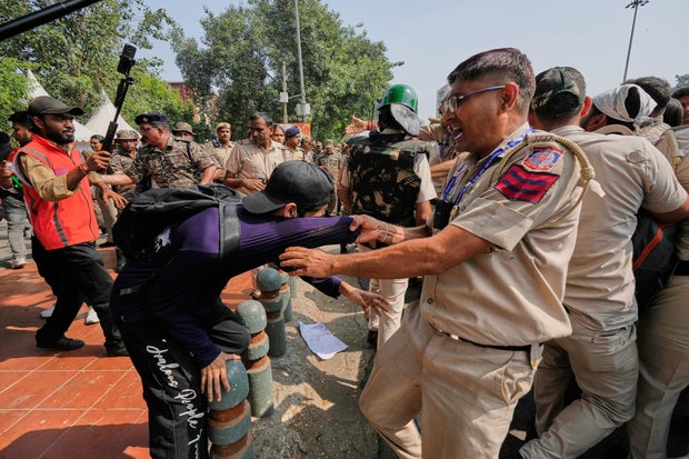 adfe187e-29c6-4c12-9e6b-4691a5afc257 Indian Security Clampdown Quashes Youth Protest in New Delhi